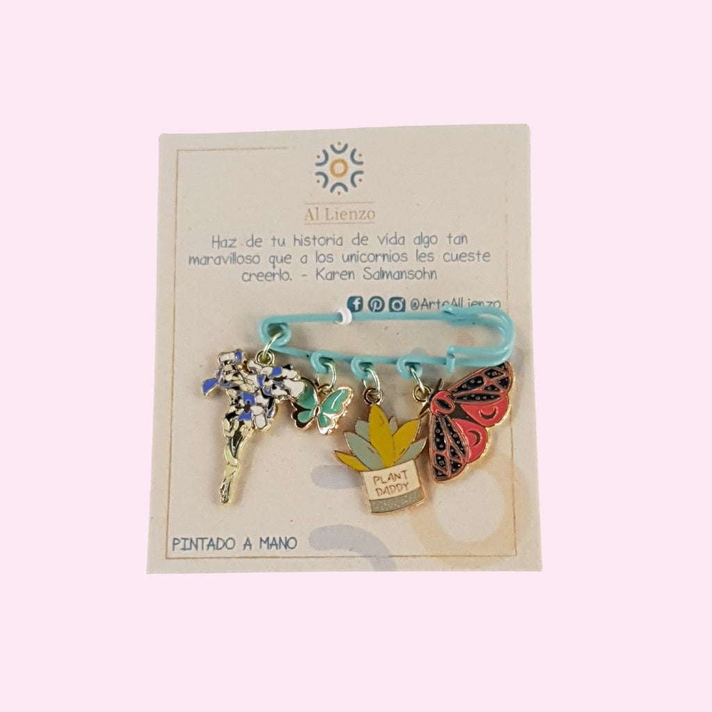 Broche con Dijes