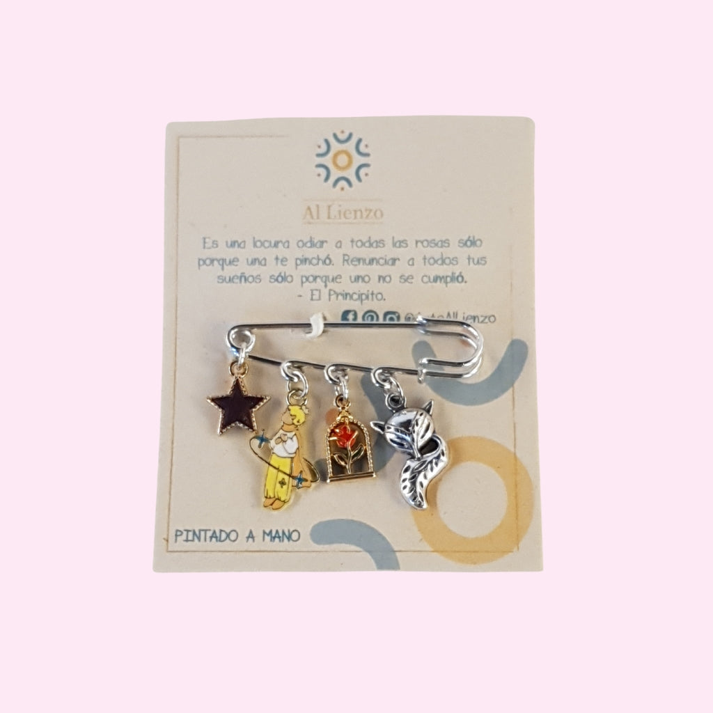 Broche con Dijes